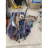 AN ASSORTMENT OF TOOLS TO INCLUDE AN EXHUAST PIPE, SHEARS AND A TENNIS RACKET ETC