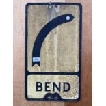 A VINTAGE STYLE 'BEND' METAL ROAD SIGN