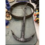 A VINTAGE CAST ANCHOR LENGTH 62CM AND AN EMBOSSED METALWARE CENTRE CEILING LIGHT HOLDER