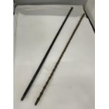 TWO SWAGGER STICKS WITH MARKED SILVER TOPS ONE WITH A BAMBOO STYLE SHAFT