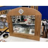 A PINE FRAMED MIRROR WITH TILE INSERT DECORATION 69CM X 63CM