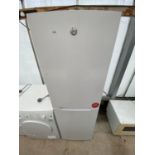 A WHITE HOOVER UPRIGHT FRIDGE FREEZER