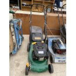A PETROL ENGINE LAWN MOWER WITH GRASS BOX BELIEVED IN WORKING ORDER BUT NO WARRANTY