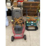 A MOUNTFIELD ELECTRIC LAWN MOWER AND A PERFORMANCE LAWN RAKE