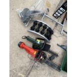 A BATTERY POWERED HEDGE TRIMMER AND AN ELECTRIC BLACK DECKER HEDGE TRIMMER ETC