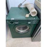 A GREEN WHITE KNIGHT SENSORDRY COMPACT TUMBLE DRYER