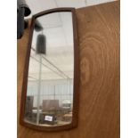 A RETRO MID CENTURY TEAK FRAMED WALL MIRROR