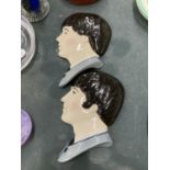 TWO MOORLAND POTTERIES WALL PLAQUES OF JOHN LENNON AND PAUL McCARTNEY