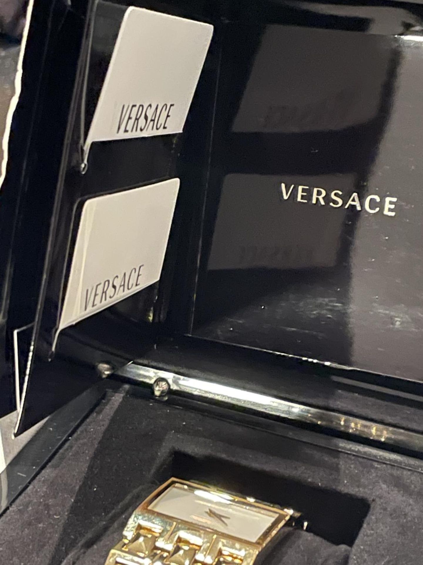 A BOXED VERSACE WRIST WATCH WITH PERALISED RECTANGULAR FACE SOFT BAG ETC - Image 5 of 7