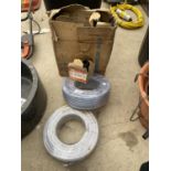 TWO ROLLS OF REINFORCED VINYL TUBE AND A LARGE ASSORTMENT OF BOLTS