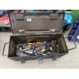 AN AMMO TIN CONTAINING TOOLS TO INCLUDE SPANNERS AND A HAMMER ETC