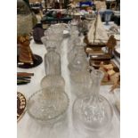 A COLLECTION OF GLASSWARE TO INCLUDE A NUMBER OF DECANTERS TO INCLUDE HOBNAIL, CUT GLASS, ETC PLUS