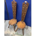 A PAIR OF CARVED OAK SPINNING CHAIRS
