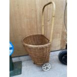 A VINTAGE 1950'S WICKER SHOPPING BASKET