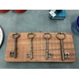AN ANTIQUE SET OF RESTORED AND MOUNTED MORTICE LOCK KEYS - 19TH CENTURY