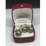 A SIXPENCE RING SIZE Q WITH A PAIR OF MATCHING CUFFLINKS