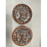A PAIR OF ORIENTAL SMALL PLATES WITH HAND PAINTED SCENE