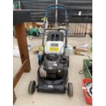 A PETROL MACALLISTER LAWN MOWER WITH A BRIGGS AND STRATTON ENGINE