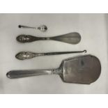 FOUR SILVER ITEMS TO INCLUDE A BACKED MIRROR, A MUSTARD SPOON AND TWO HANDLES ITEMS BUTTON HOOK