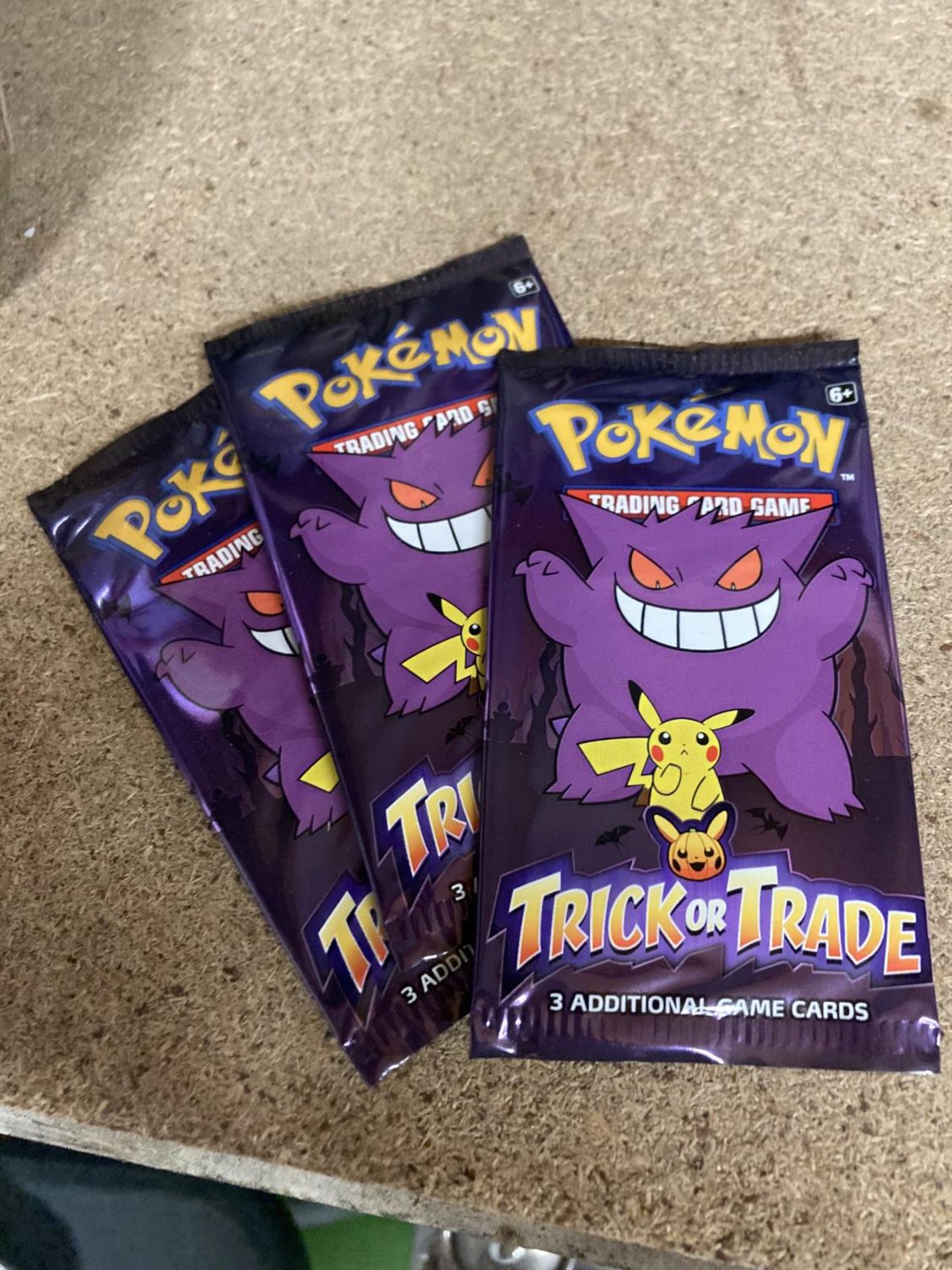 THREE SEALED U. S. A. EXCLUSIVE TRICK OR TRADE POKEMON CARDS, BOOSTER PACKS