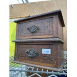 A VINTAGE WOODEN TWO DRAWER CHEST