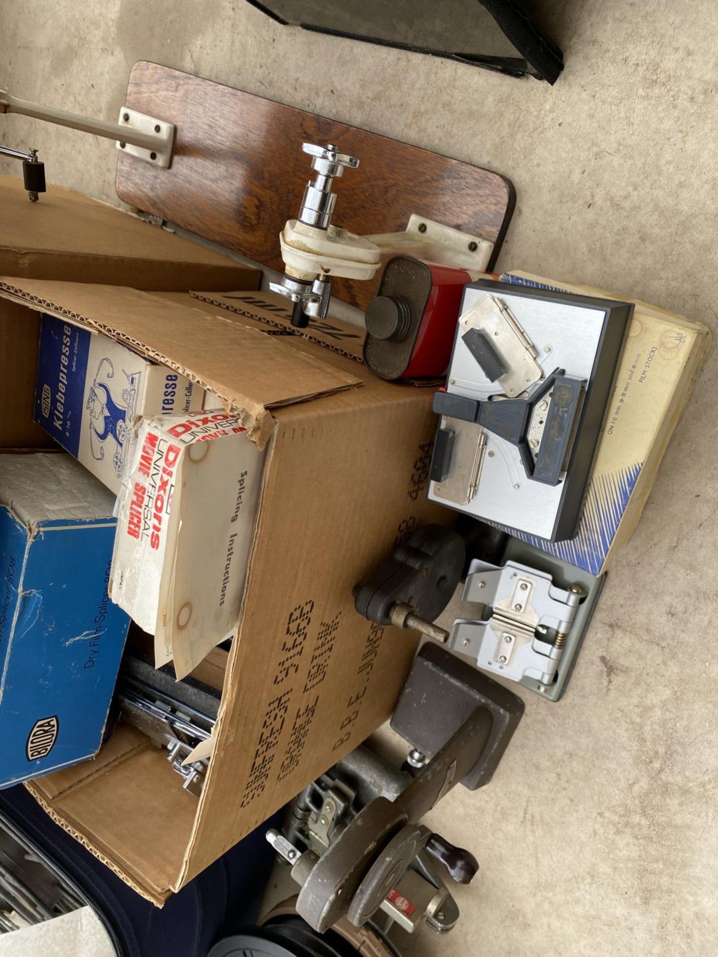AN ASSORTMENT OF FILM EQUIPMENT TO INCLUDE PROJECTOR LAMPS AND FILM WINDERS ETC - Image 2 of 4