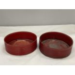 A PAIR OF BELIEVED ENGLISH REGENCY CIRCA 19TH CENTURY WINE COASTERS IN CINNABAR RED LACQUER