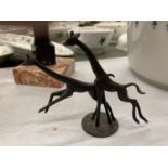 A SMALL BRONZE STUDY OF GIRAFFES RUNNING HEIGHT 9CM