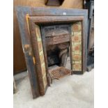 A VICTORIAN CAST IRON FIRE PLACE WITH TILED SURROUND AND FIRE GRATE (H:97CM W:97CM)
