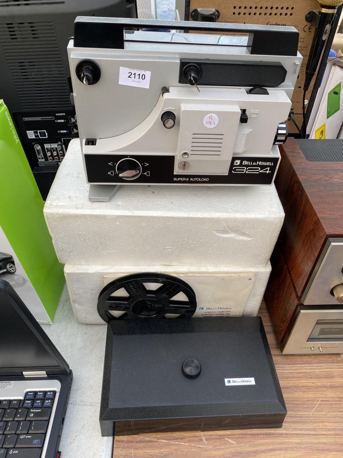 A BELL & HOWELL 324 SUPER 8 PROJECTOR