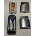 FOUR VARIOUS VINTAGE CIGARETTE LIGHTERS ONE BETTY BOO