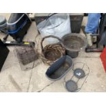 AN ASSORTMENT OF ITEMS TO INCLUDE A METAL PLANTER AND A WICKER BASKET ETC