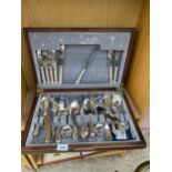 A WOODEN CASED CANTEEN OF SHEFIELD STAINLESS STEEL CUTLERY