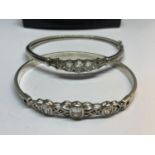 TWO SILVER BANGLES WITH CLEAR STONES IN A PRESENTATION BOX