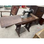 A SINGER TREADLE SEWING MACHINE