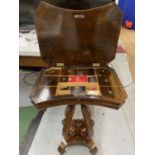 A VICTORIAN BURR WALNUT SEWING TABLE WITH INNER COMPARTMENTS AND SEWING EQUIPMENT, HEIGHT OF TABLE