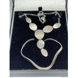 A MARKED SILVER NECKLACE AND BANGLE IN A PRESENTATION BOX
