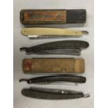 A GROUP OF VINTAGE CUT THROAT RAZORS