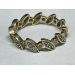 A 9 CARAT GOLD ETERNITY RING WITH DIAMONDS SIZE M/N