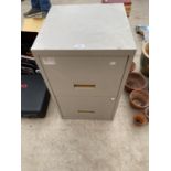 A TWO DRAWER METAL FILING CABINET