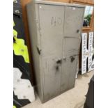 A VINTAGE METAL OFFICE STORAGE CABINET BEARING THE LABEL 'ART METAL LONDON'