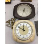 A VINTAGE SMITH'S KITCHEN CLOCK AND A BAKELITE BAROMETER