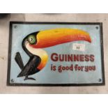 A CAST METAL GUINNESS SIGN