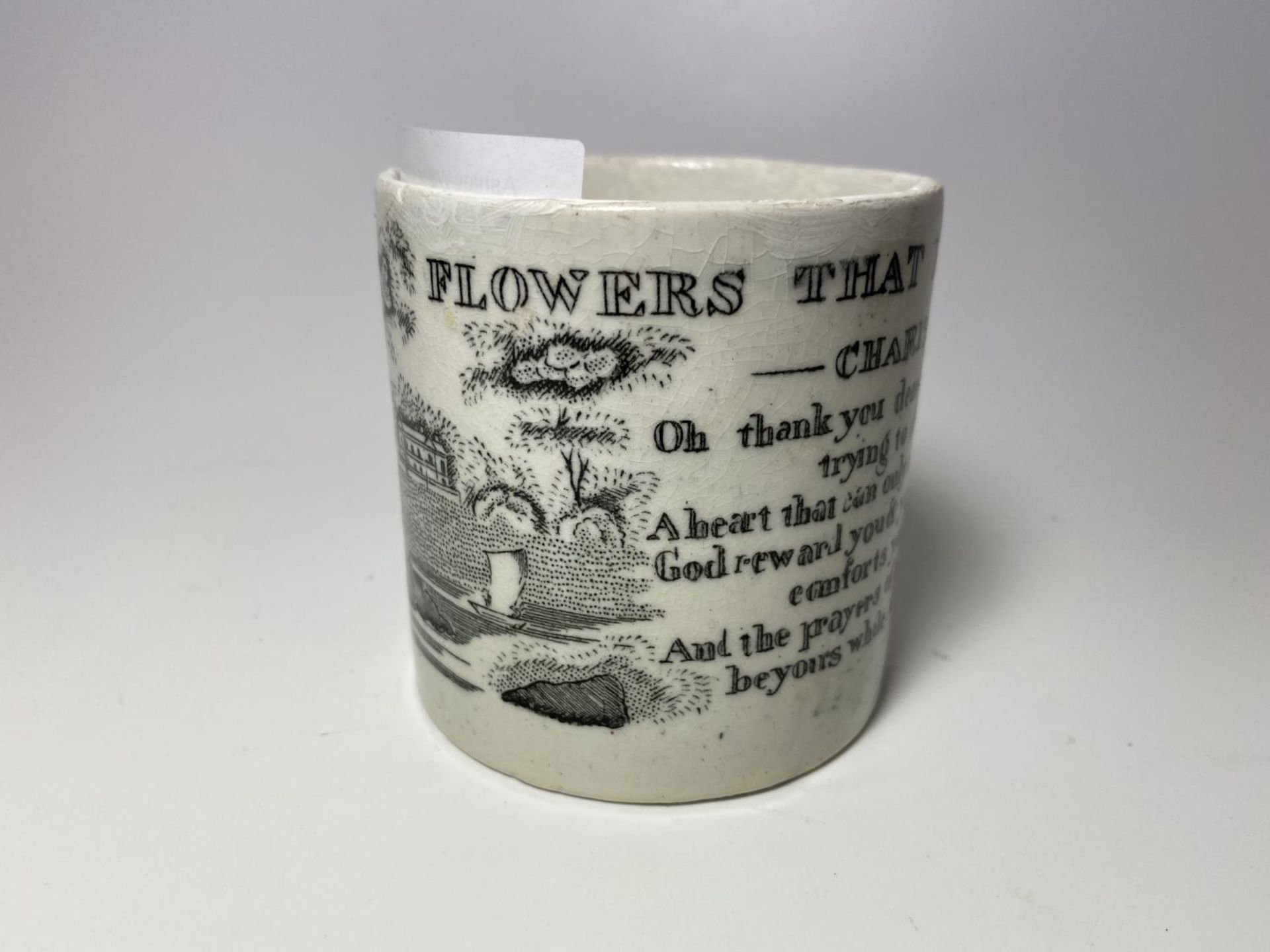AN EARLY 19TH CENTURY POTTERY POEM CUP / MUG - 'FLOWERS NEVER FADE' (A/F) - Image 2 of 4