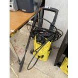 A KARCHER K4 ELECTRIC PRESSURE WASHER WITH PATIO CLEANING ATTATCHMENT