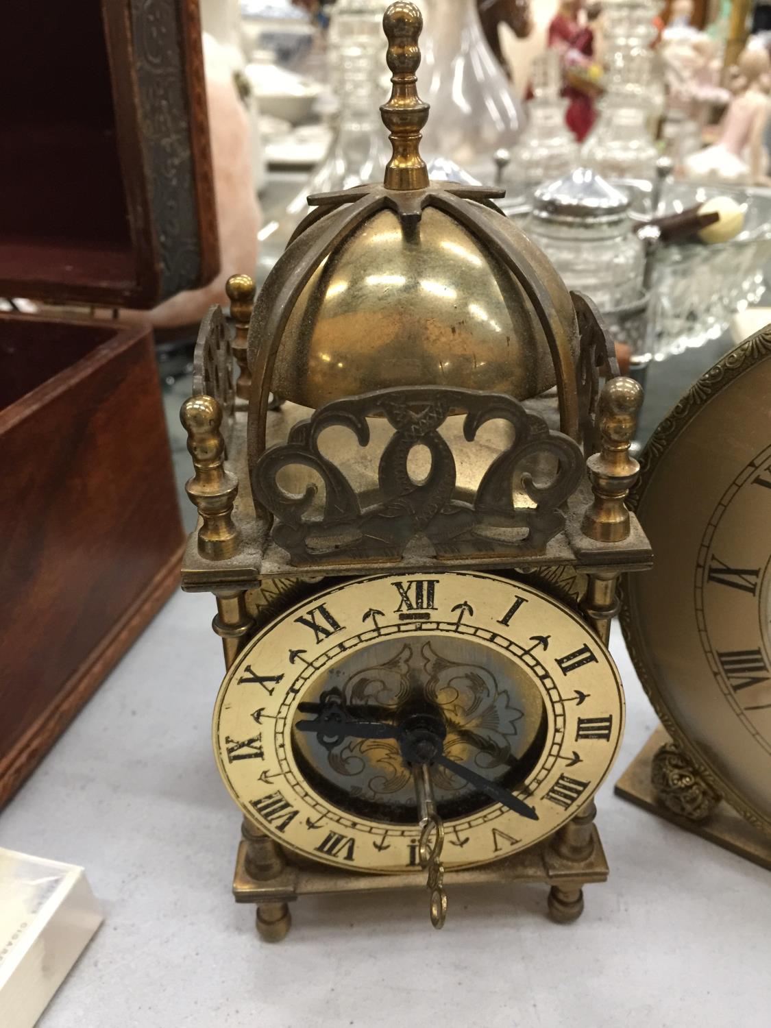 THREE VINTAGE CLOCKS TO INCLUDE A BRASS LANTERN CLOCK, A PETIT POINT MANTLE CLOCK AND ALARM CLOCK - Image 4 of 5