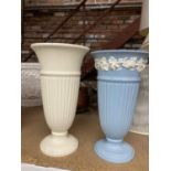 TWO LARGE WEDGWOOD VASES, ONE A PALE BLUE WITH JASPERWARE STYLE DECORATION HEIGHT 27CM, THE OTHER