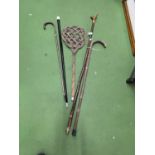 FOUR WOODEN WALKING STICKS AND A PANEL BEATER