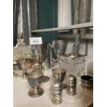 A QUANTITY OF SILVER PLATED ITEMS TO INCLUDE A CRUET SET WITH BLUE GLASS LINERS, GOBLETS, TANKARD,