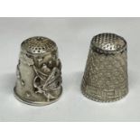 TWO SILVER THIMBLES